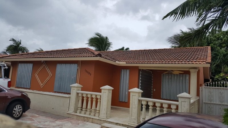 Steel storm panels protecting a Miami home